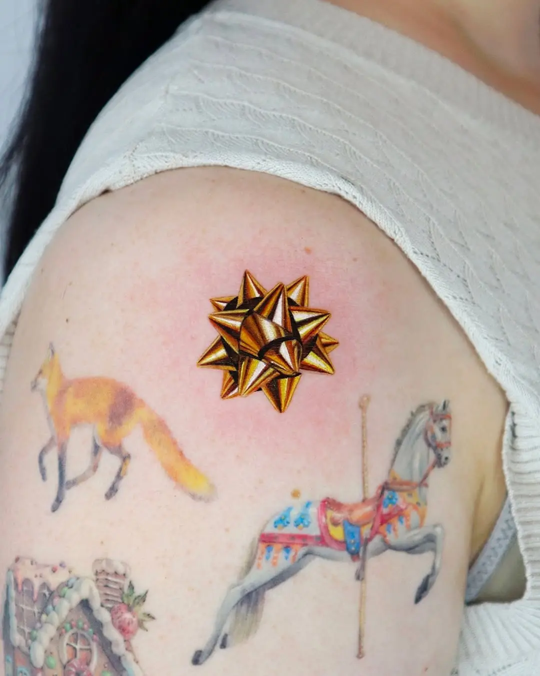 Vibrant bow tattoo with striking colors.