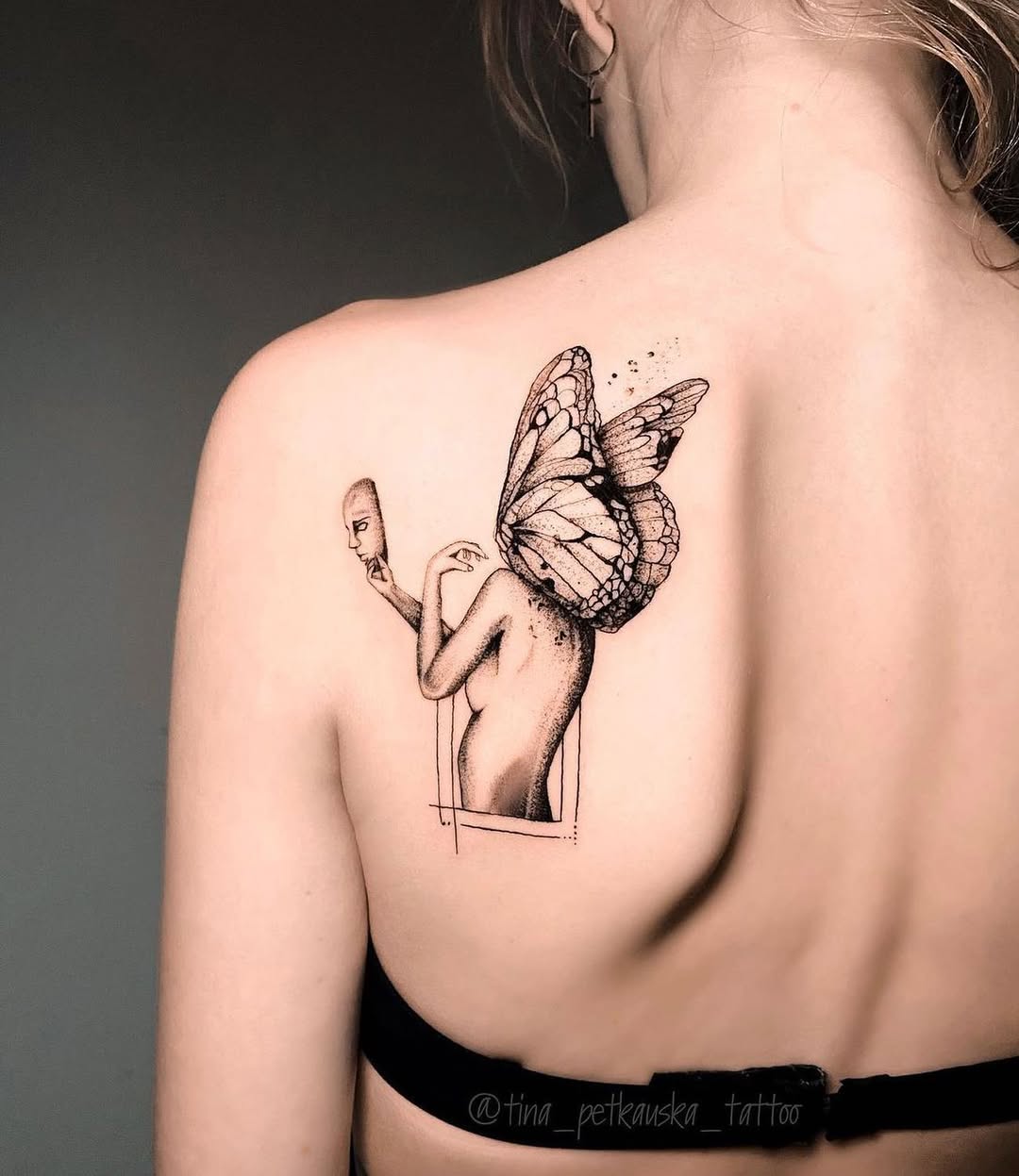 Stunning butterfly tattoo with human silhouette