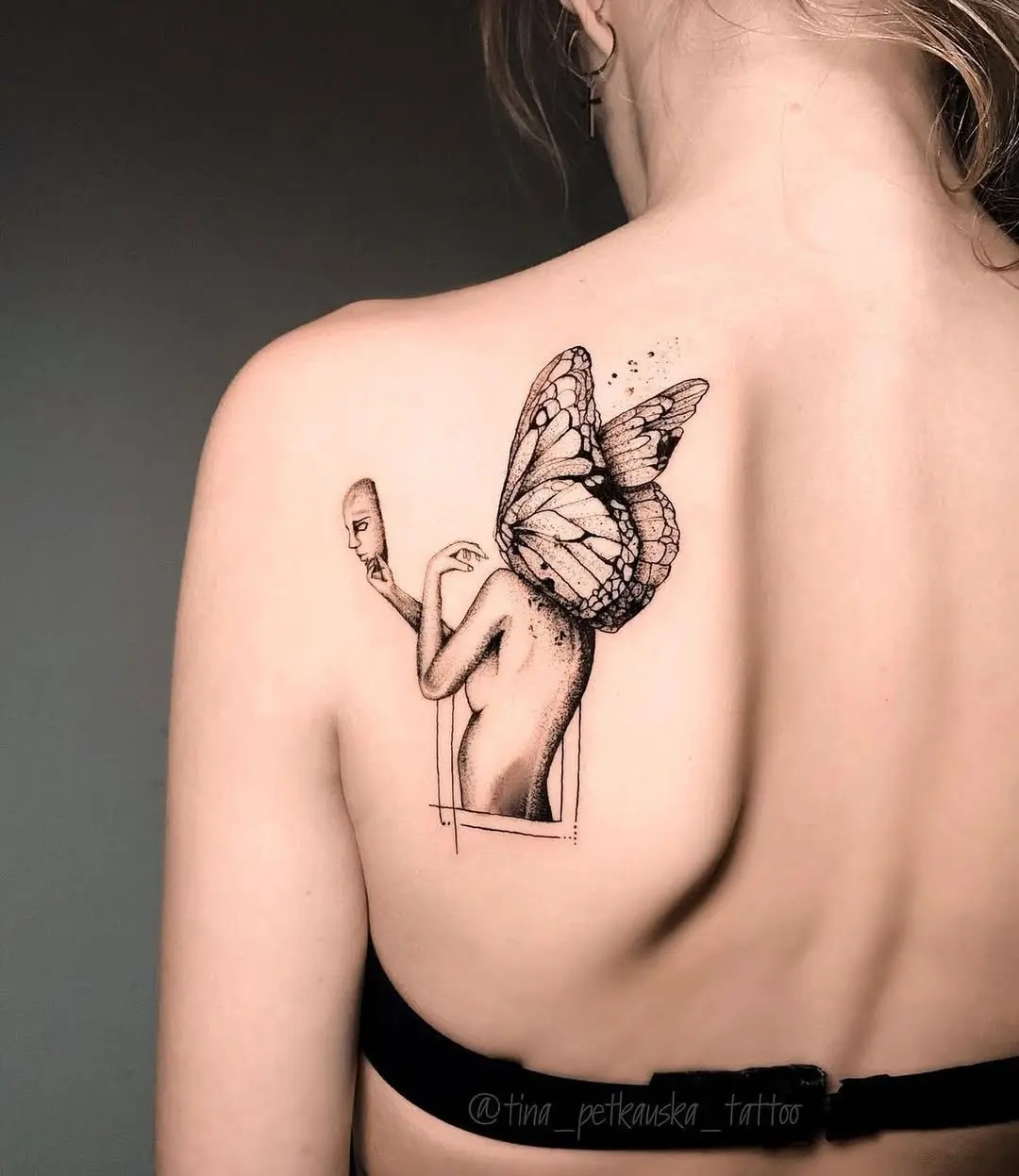 Stunning butterfly tattoo with human silhouette