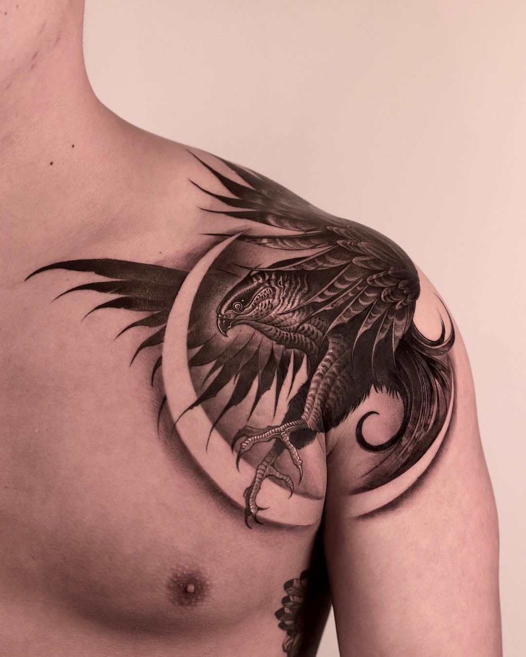 Majestic eagle wing shoulder tattoo design