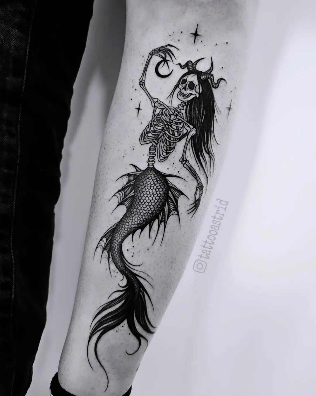 Eerie Skeleton-Mermaid Tattoo with Mystical Vibes