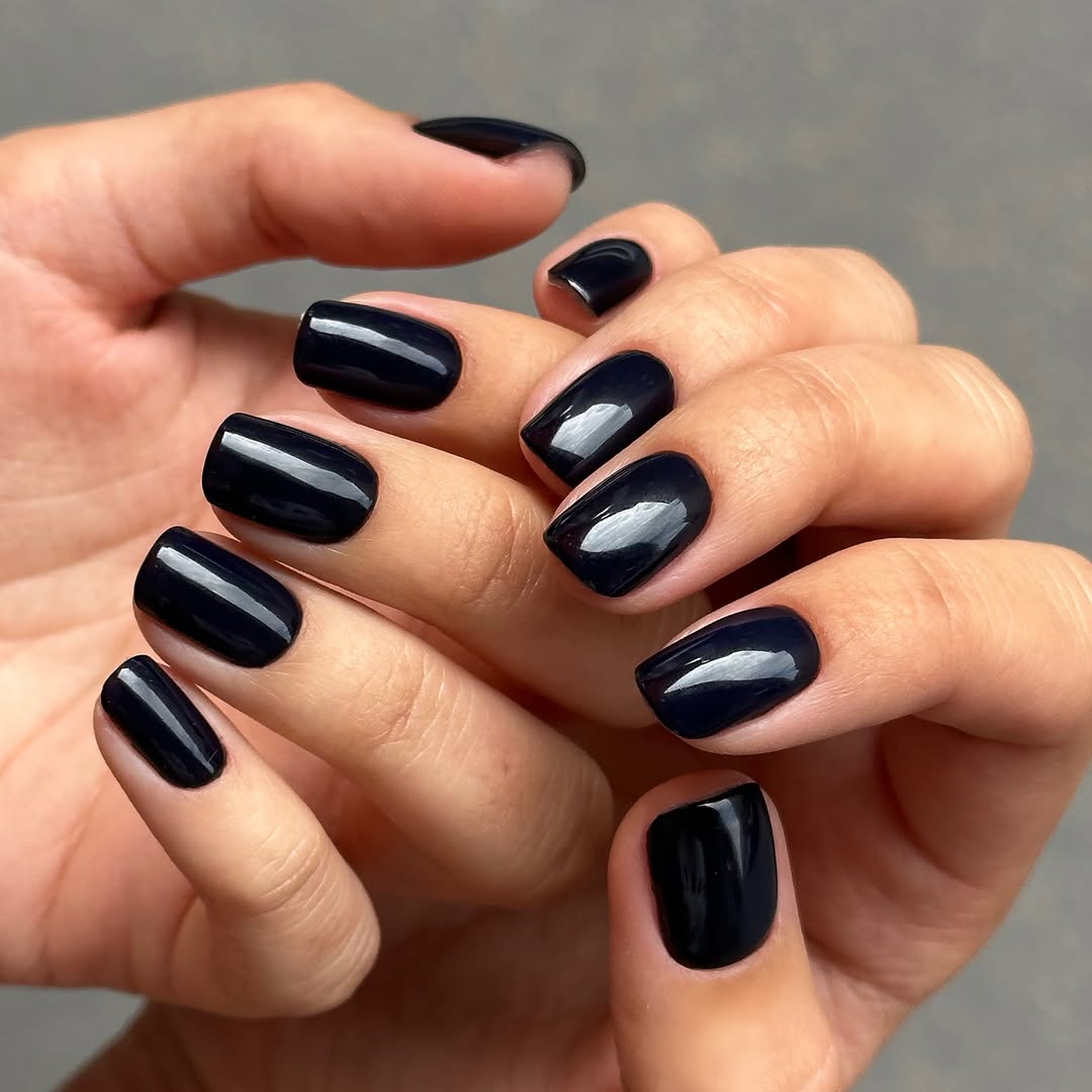 Sleek and Glossy Black Nail Design Inspiration