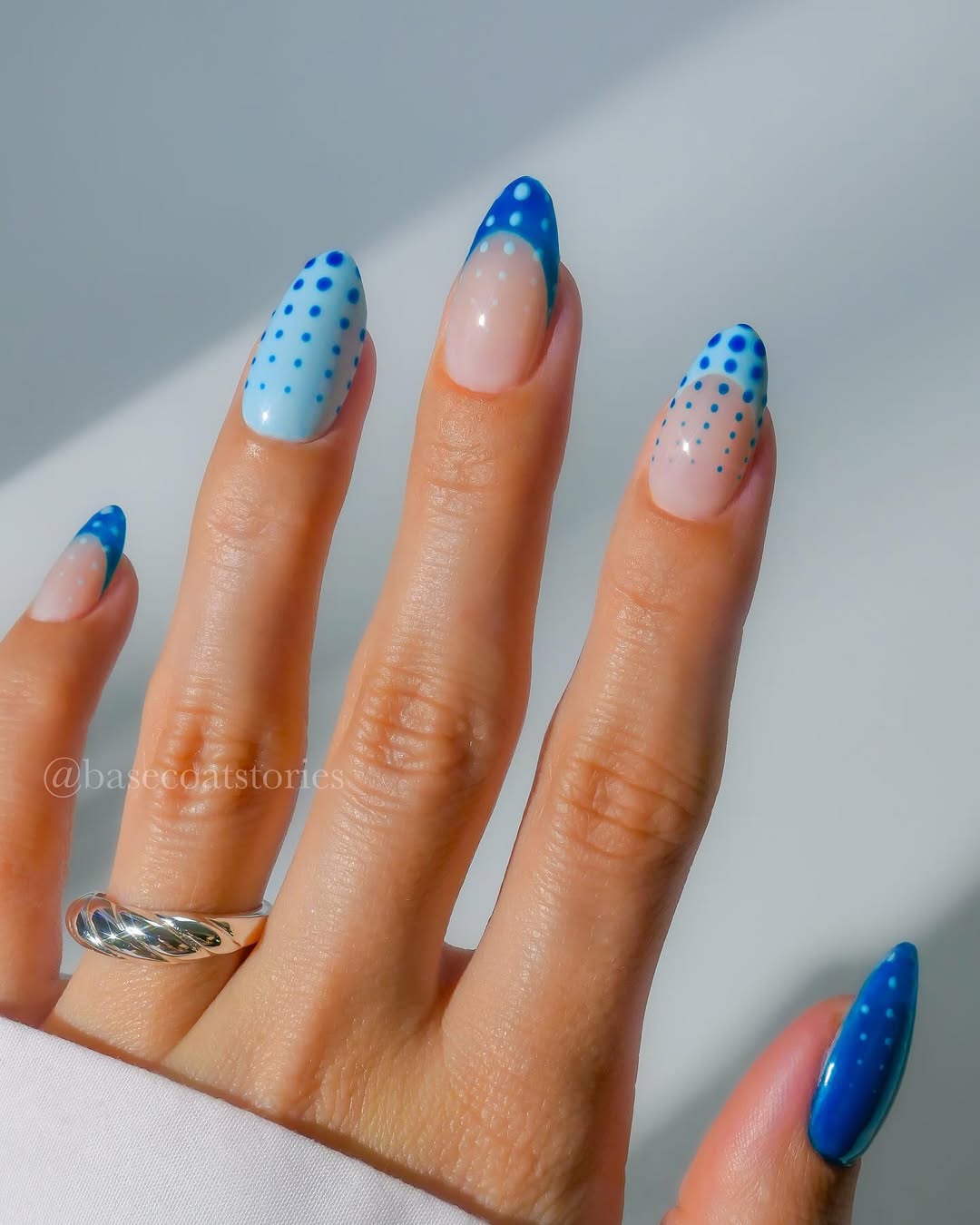 Trendy Blue Nails with Playful Dot Details