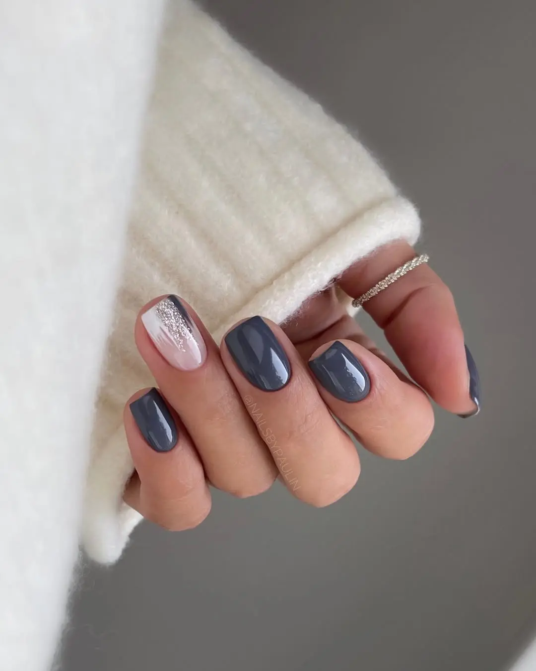 Chic grey nails with a stylish accent