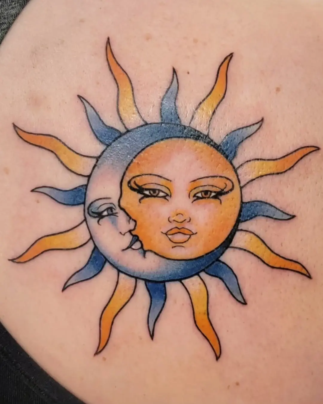Stunning Sun and Moon Face Tattoo Art