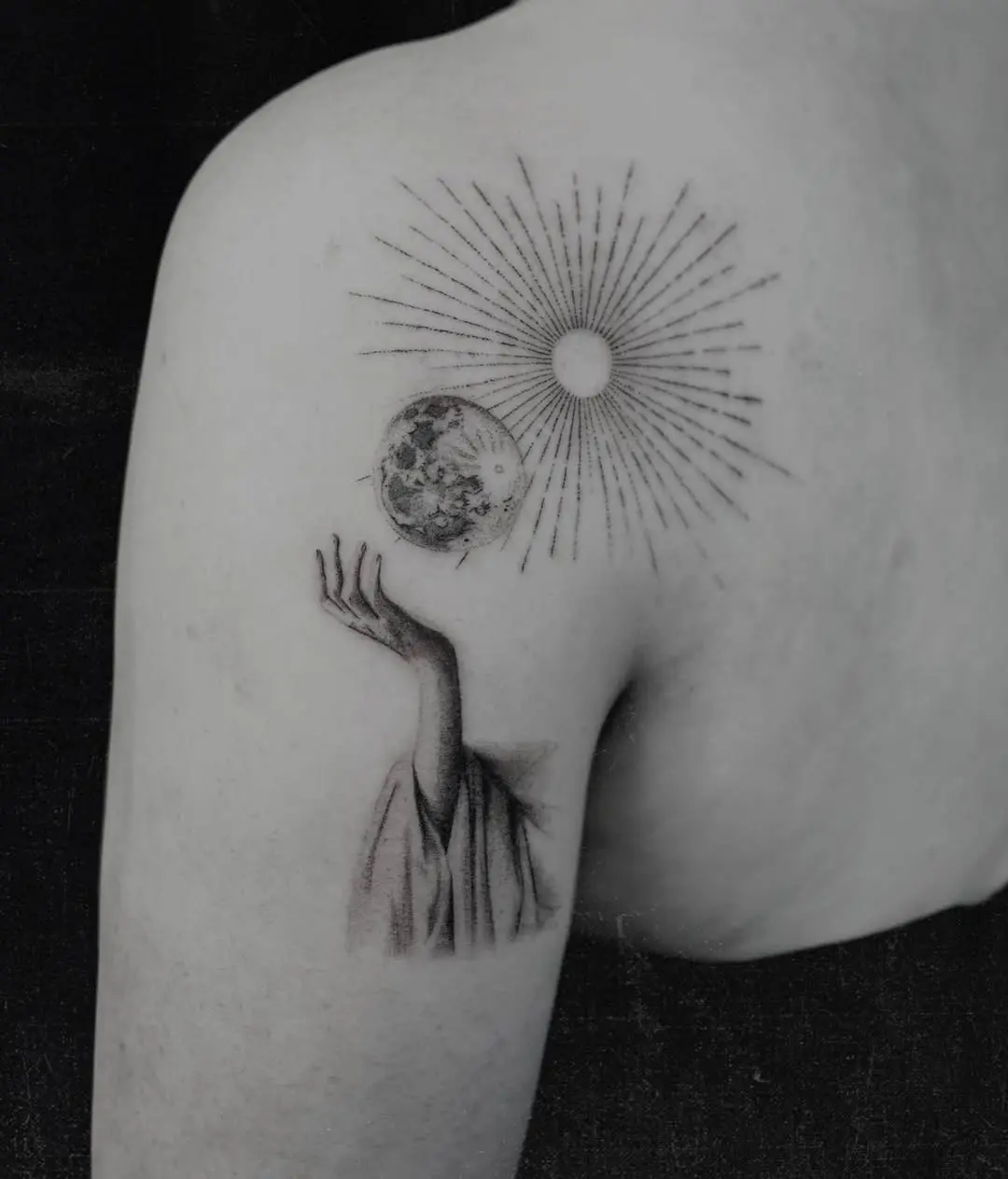Mystical sun and moon with a gentle hand