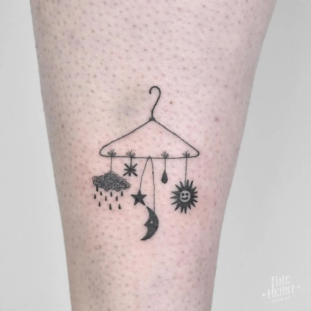 Charming mobile of sun and moon elements