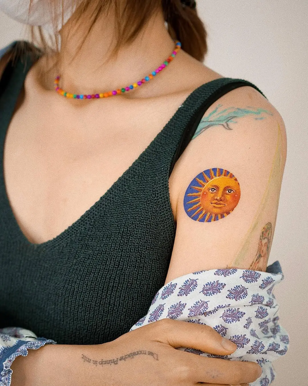 Vibrant Sun Tattoo on Display