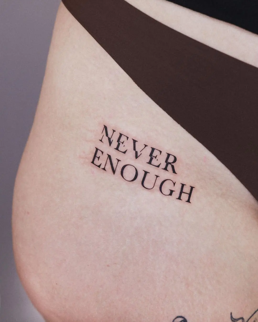 Minimalist Tattoo with Profound Text Meaning