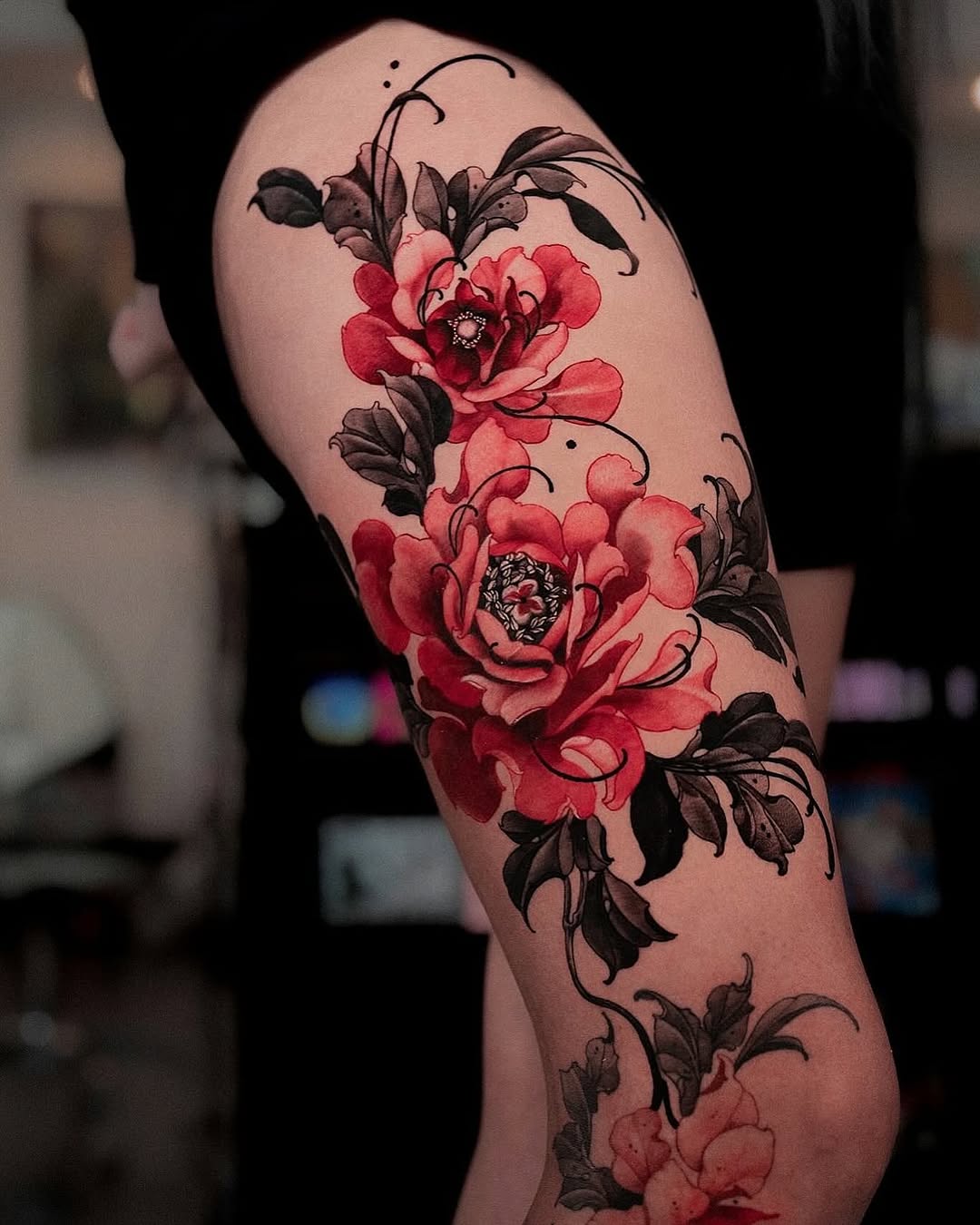 Bold and Beautiful Floral Thigh Tattoo Design