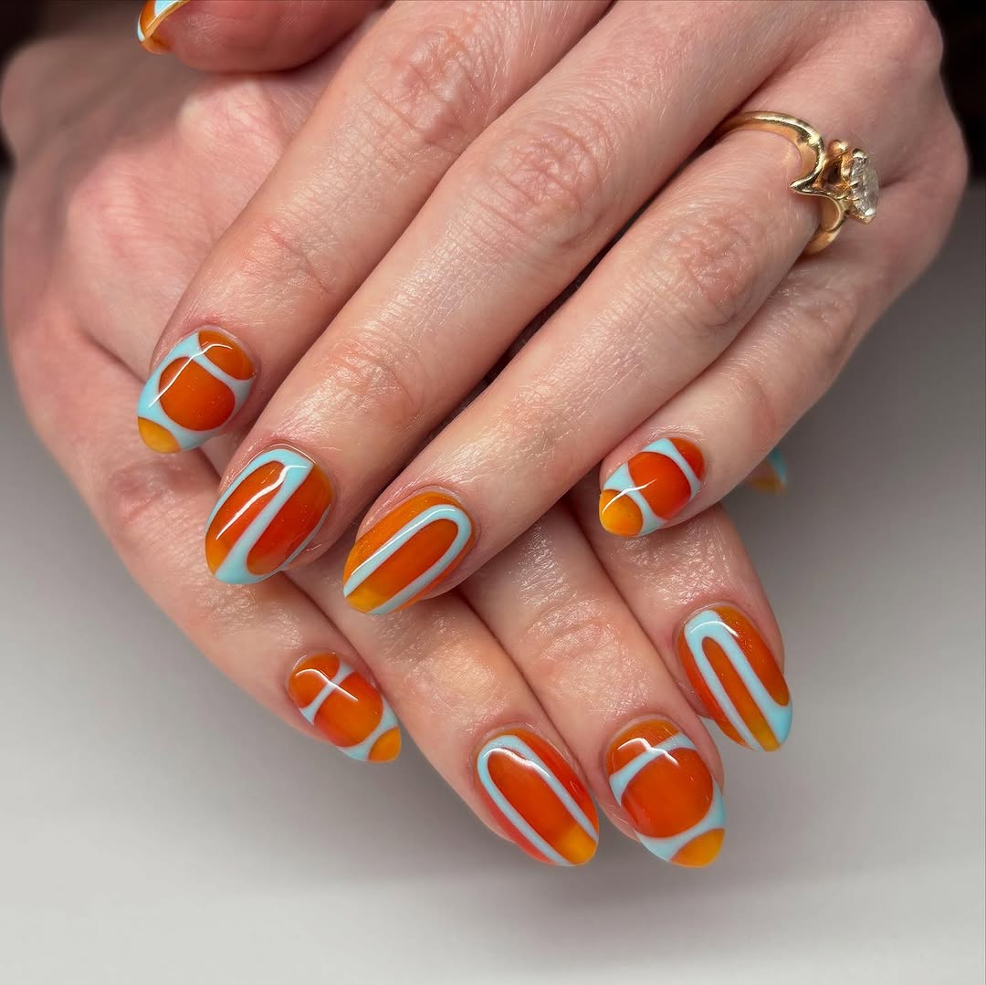 Stylish orange and blue nail art design