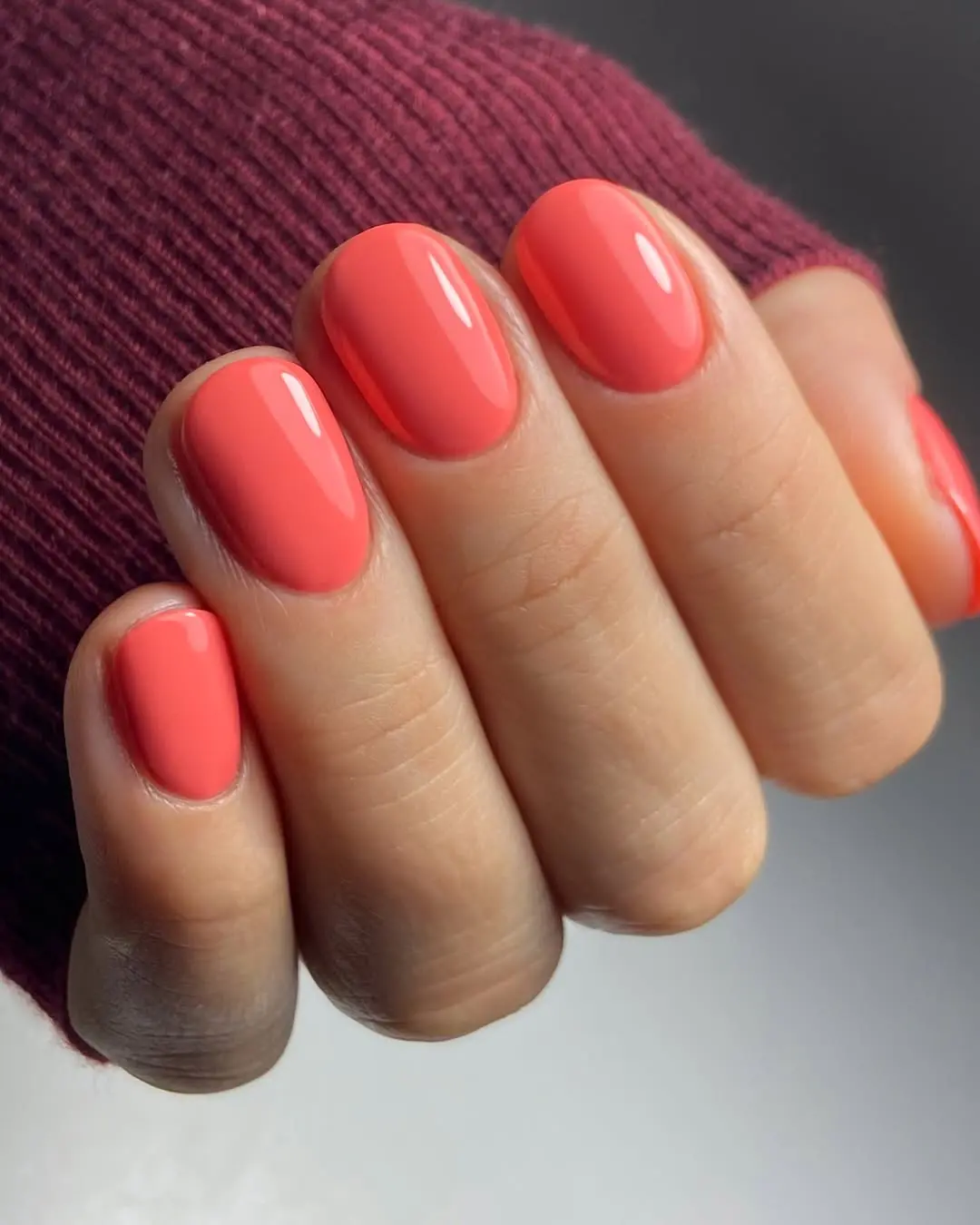 Chic glossy orange nails for every season