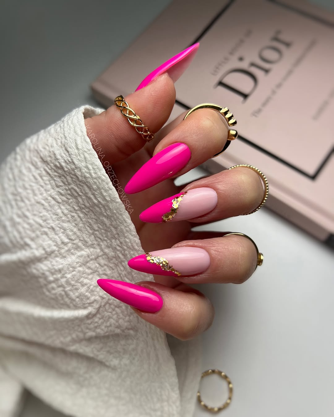 Stylish Pink Nails with Elegant Gold Accents