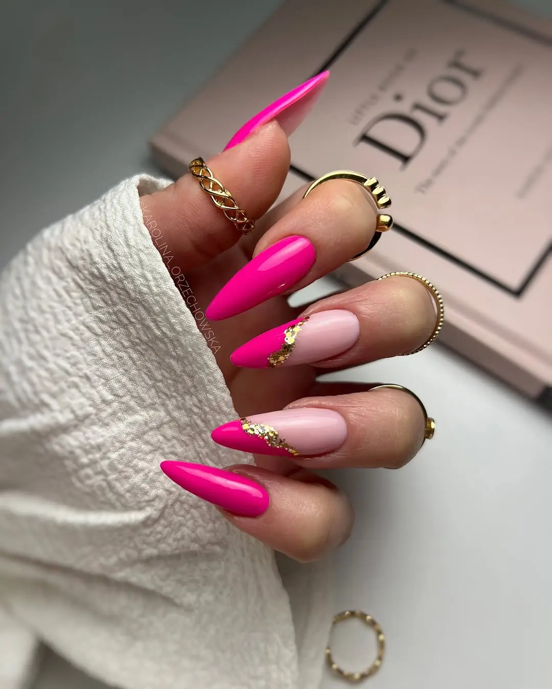 Stylish Pink Nails with Elegant Gold Accents