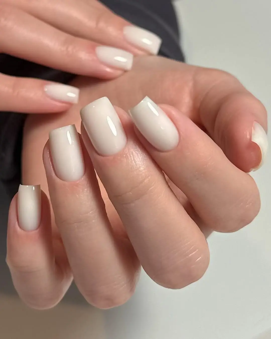 Elegant white square nails with a glossy finish