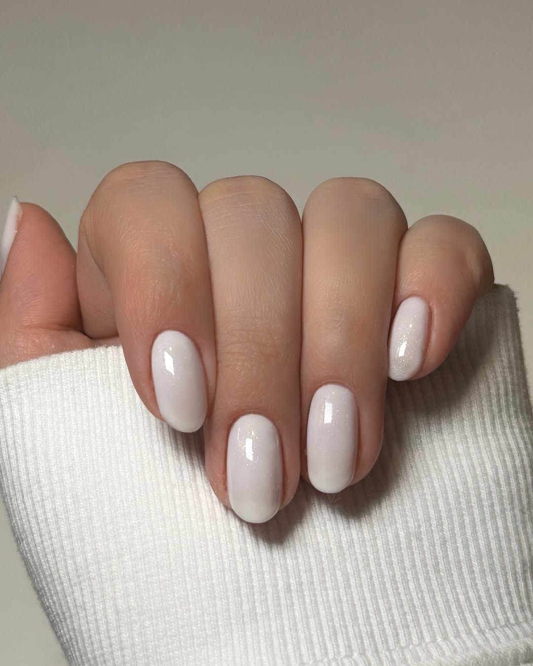 Elegant white nails with a subtle shine