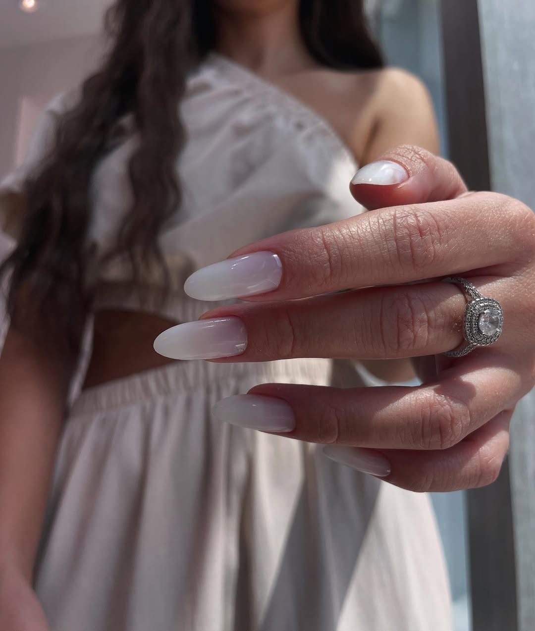 Elegant white nails with a chic design