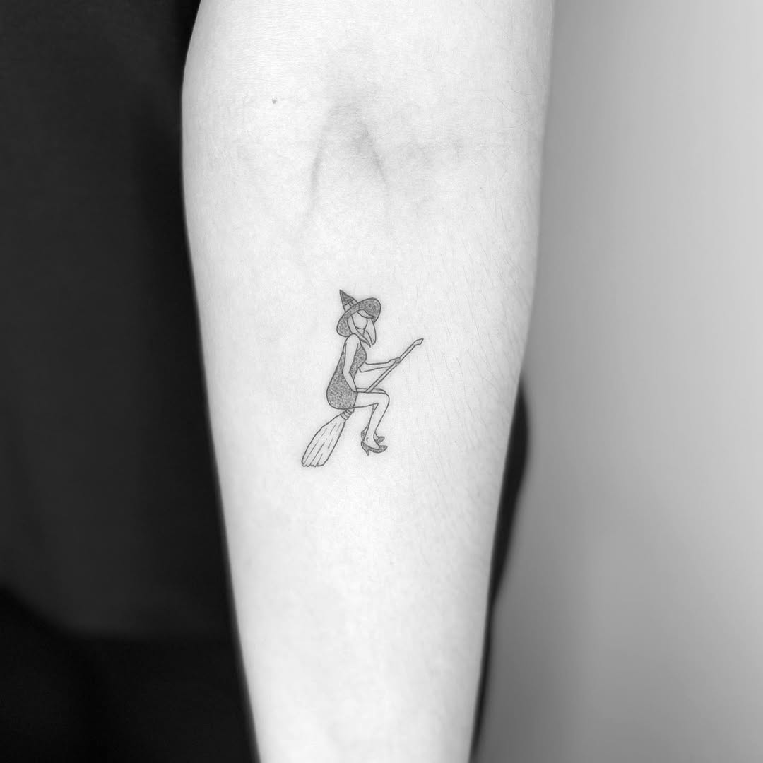 Charming Witch on a Broomstick Tattoo