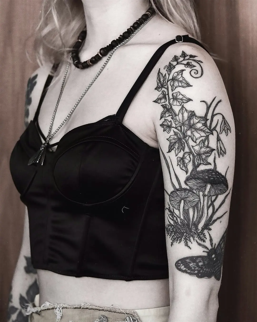 Intricate Flora and Fauna Tattoo Design