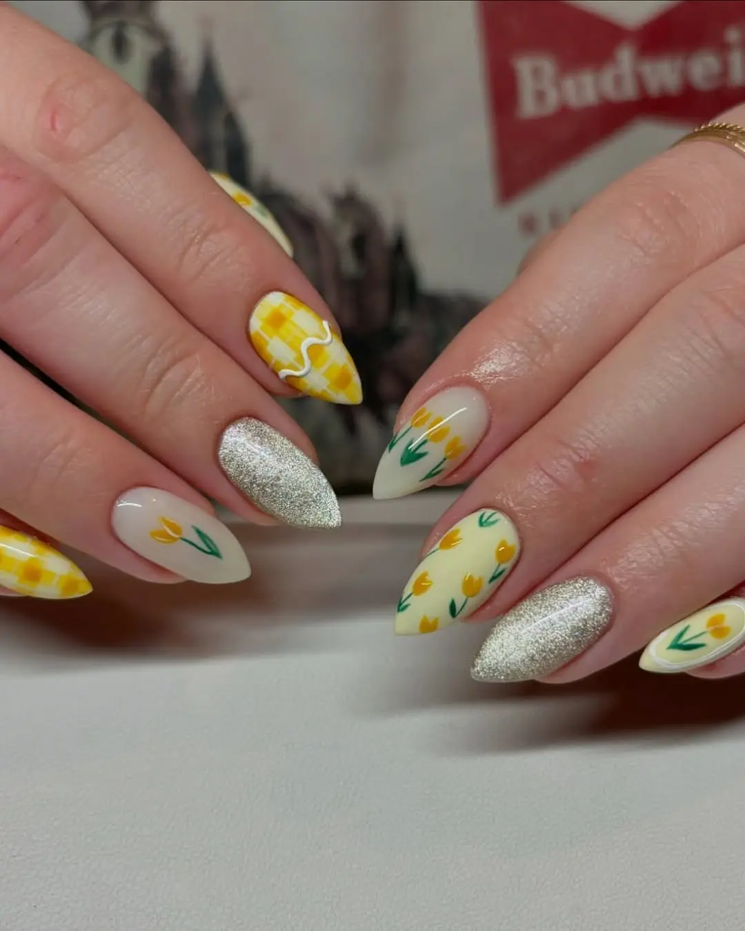 Charming yellow nails with floral designs