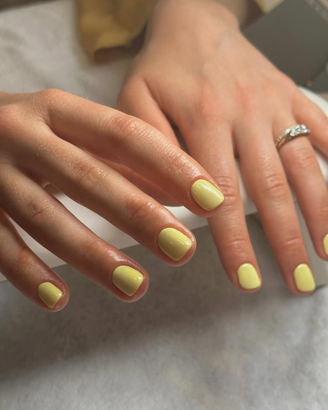 Bright yellow nails for a cheerful vibe