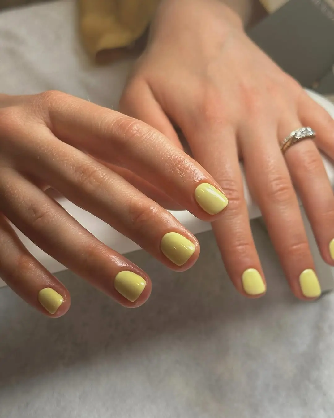 Bright yellow nails for a cheerful vibe