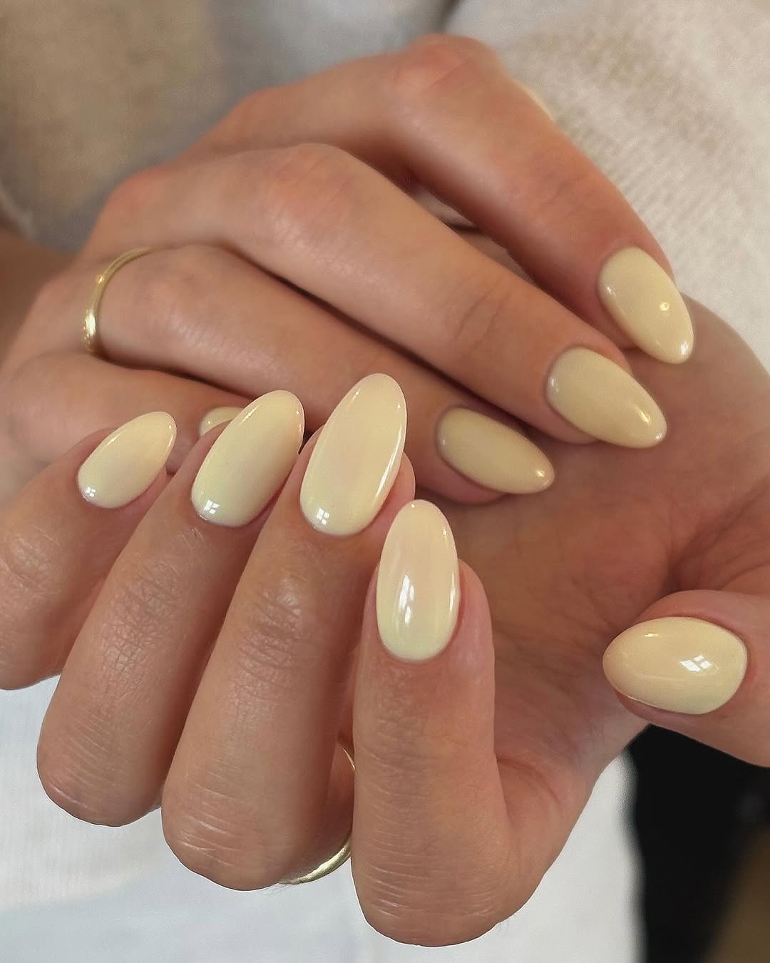 Shiny Oval Yellow Nails for a Chic Look