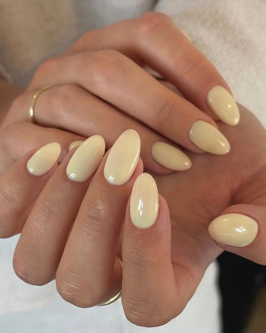 Shiny Oval Yellow Nails for a Chic Look