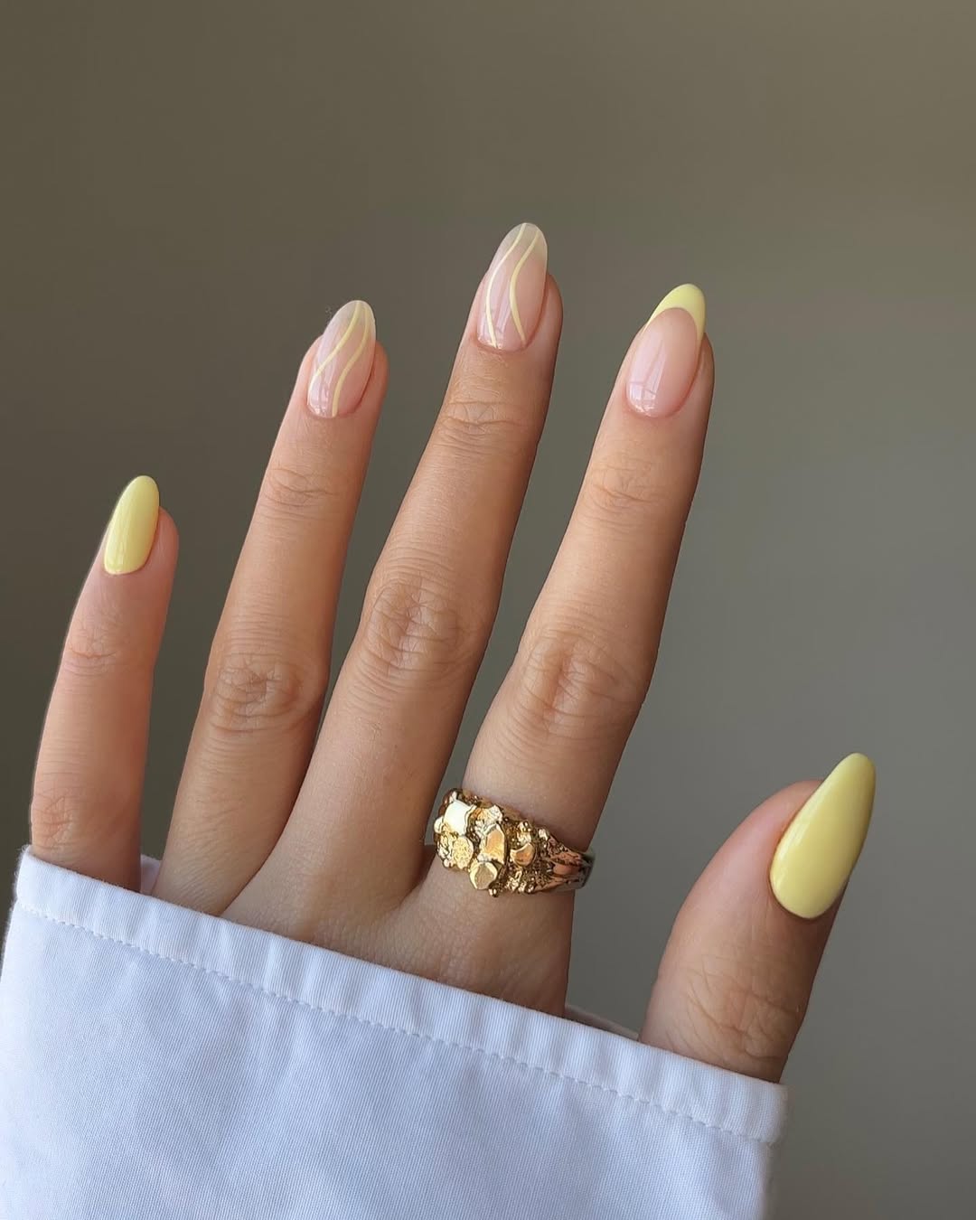 Chic yellow nails with elegant accents