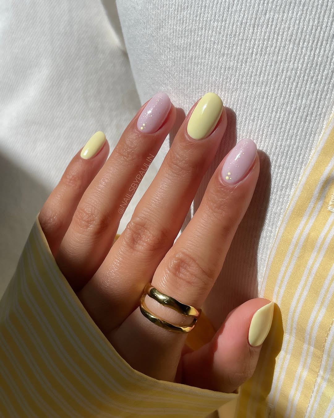 Sunny Yellow Nail Design with Soft Accents