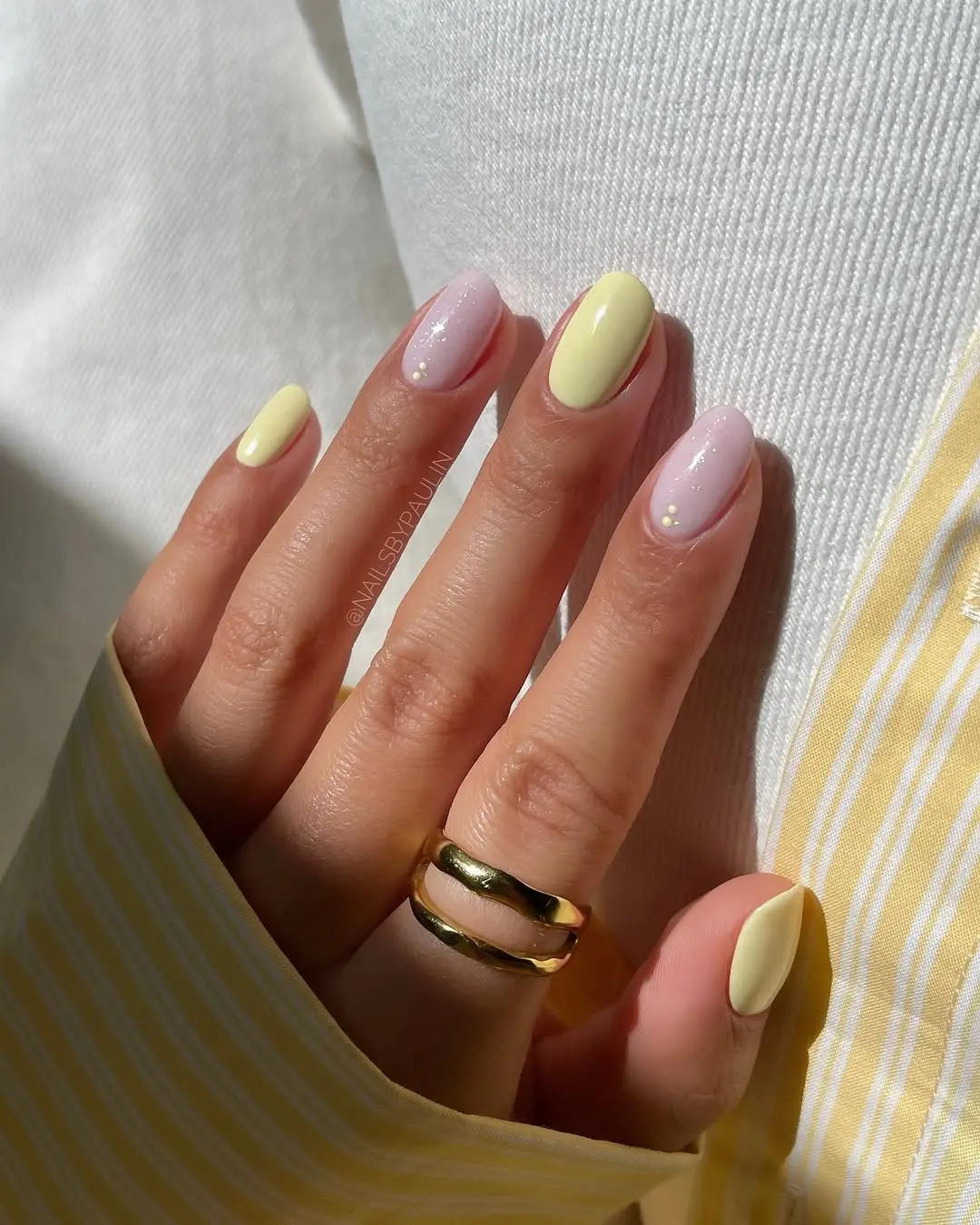 Sunny Yellow Nail Design with Soft Accents