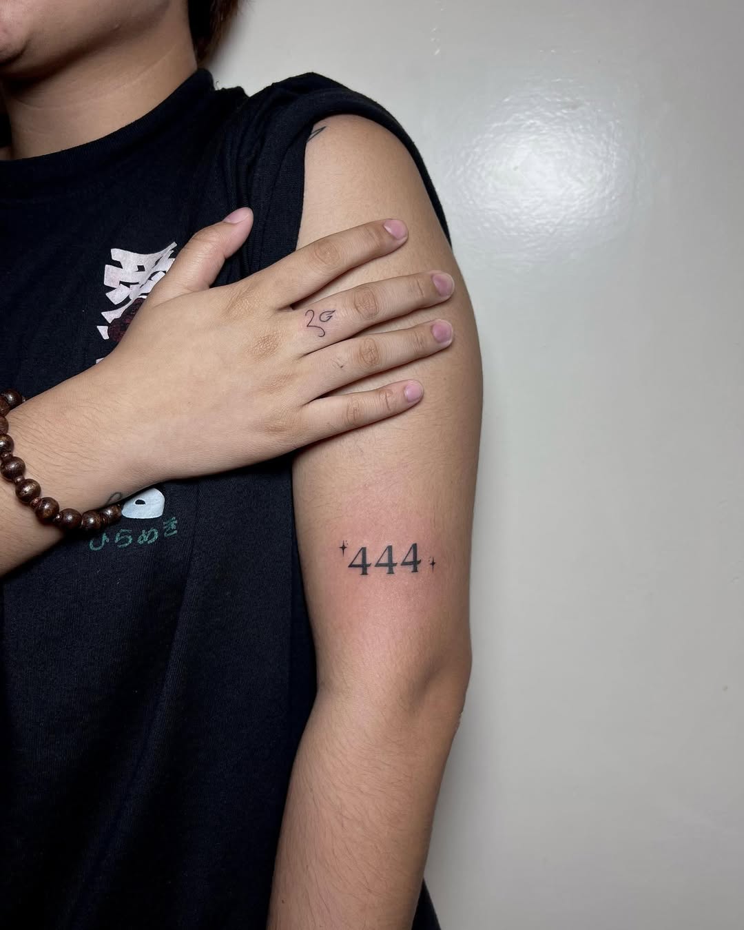 Meaningful 444 Tattoo on an Arm