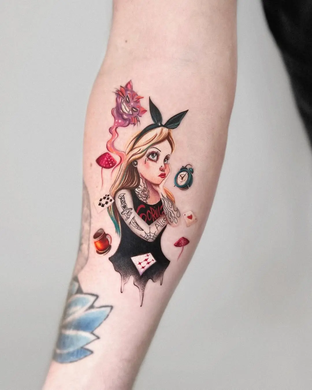 Whimsical Alice in Wonderland tattoo design
