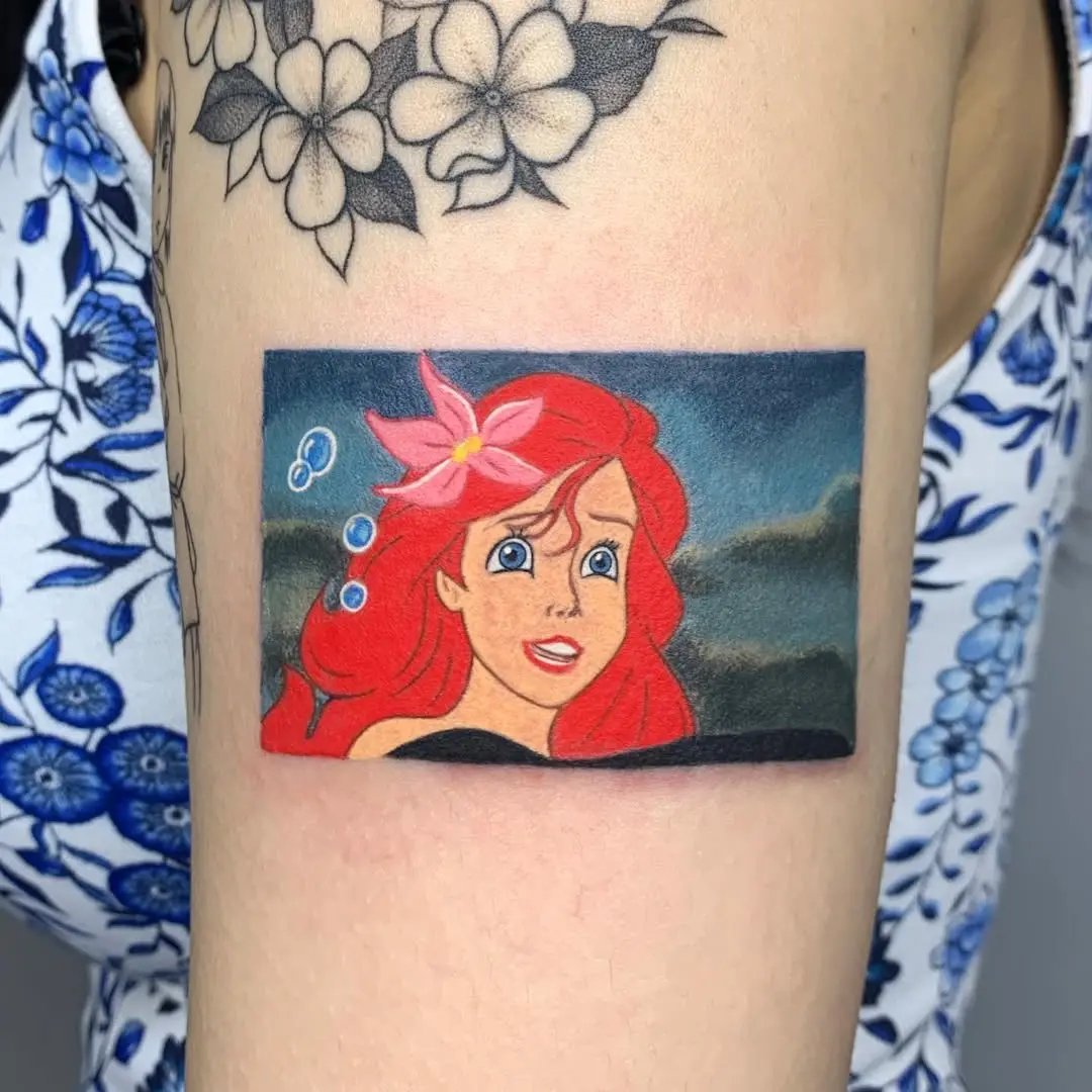 Vibrant Ariel Tattoo with Bold Colors
