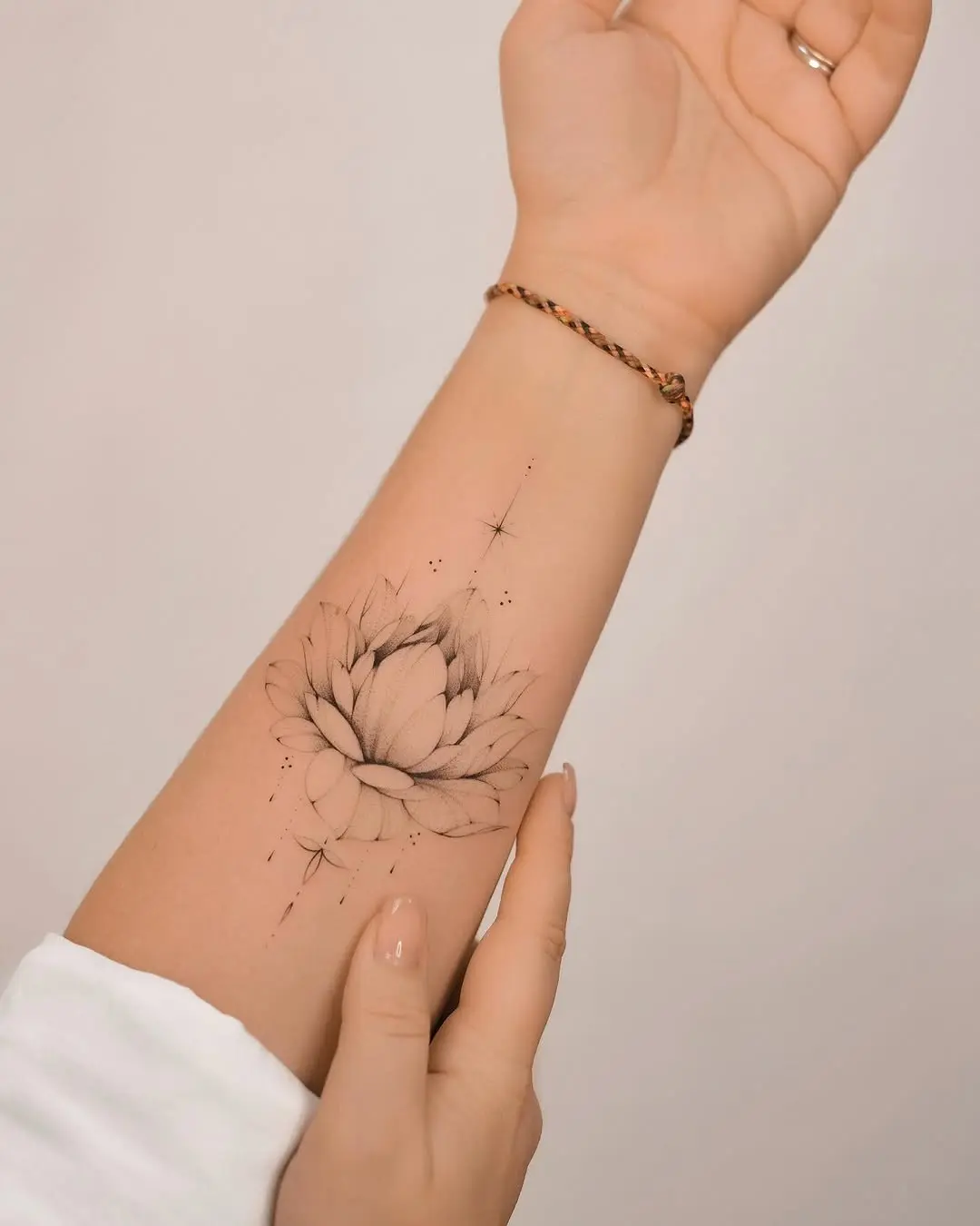 Elegant floral arm tattoo inspiration for women