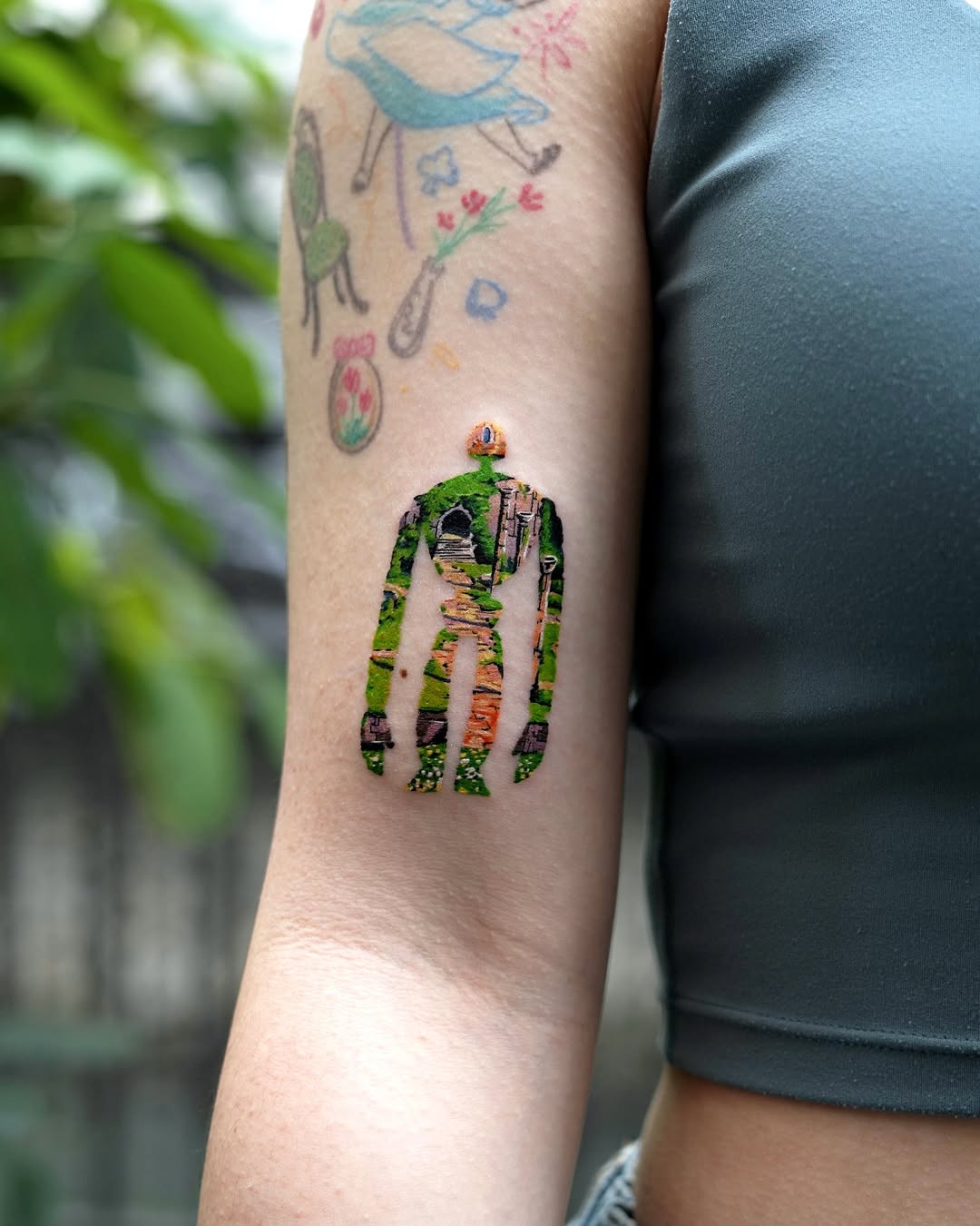 Unique nature-inspired arm tattoo design for women