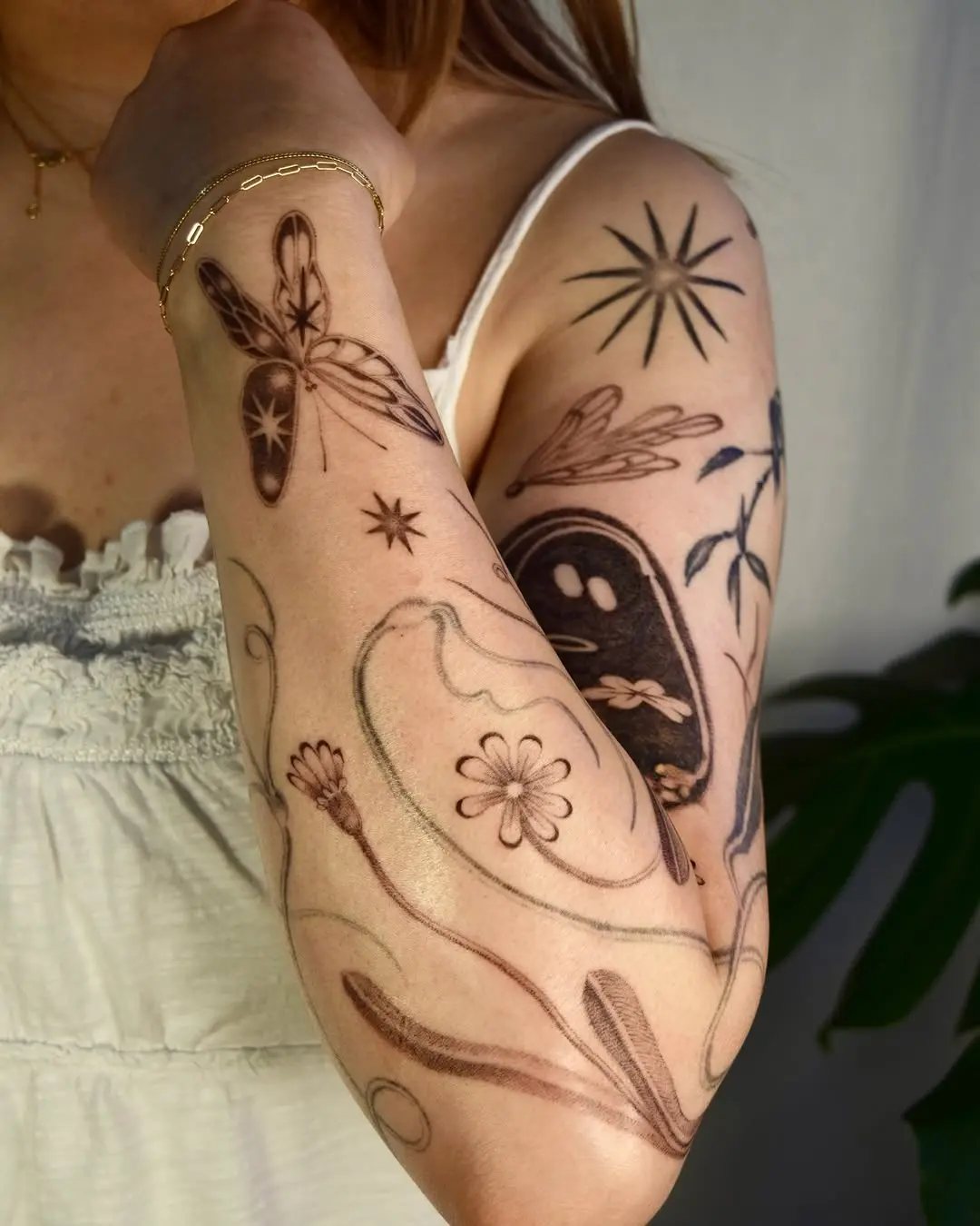 Unique and minimalist arm tattoo designs for women