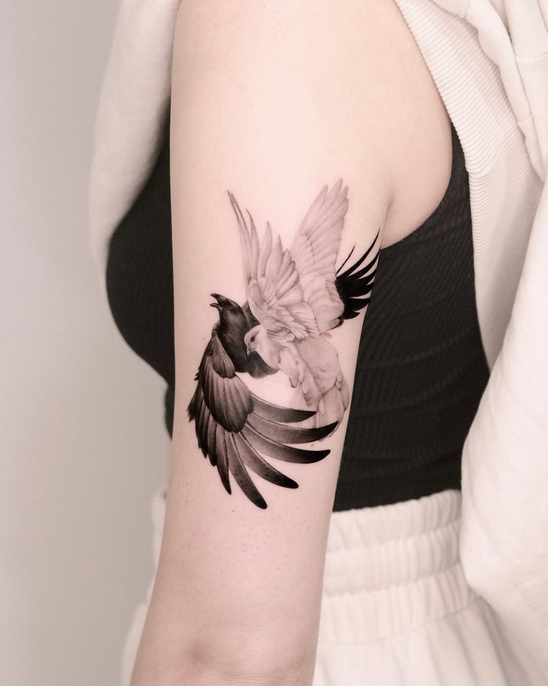 Elegant bird tattoos embody freedom and grace.