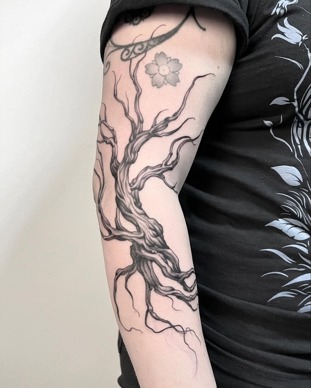 Elegant tree tattoo showcasing intricate details