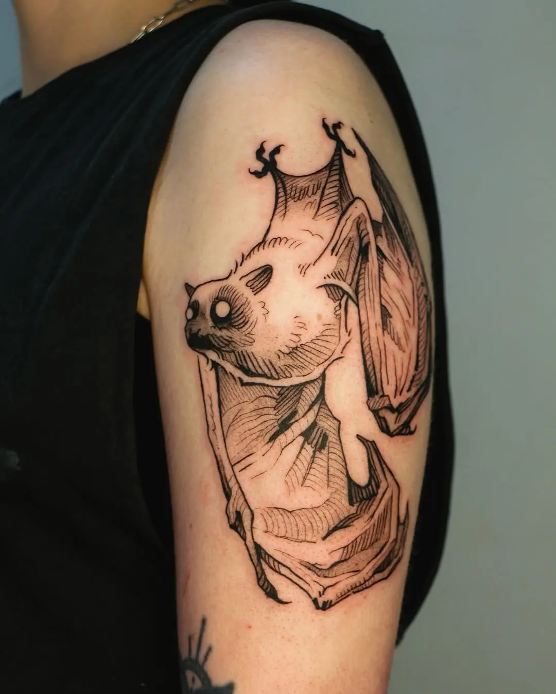 Stylish Bat Tattoo in Black and White Ink