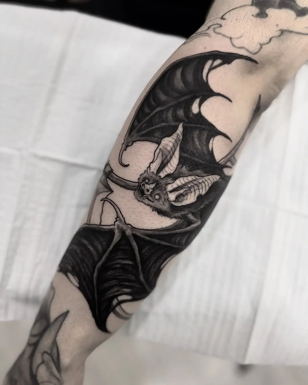 Stylish bat tattoo with intricate details
