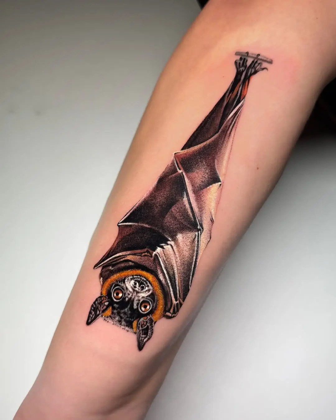 Realistic bat tattoo showcasing intricate details