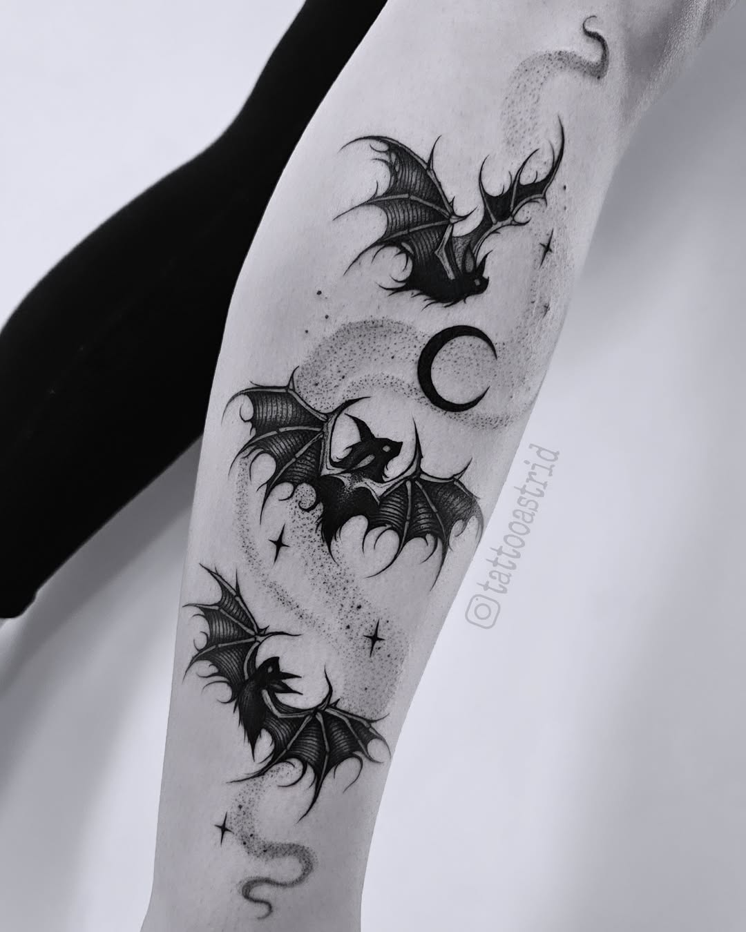 Elegant bat tattoos with mystical designs