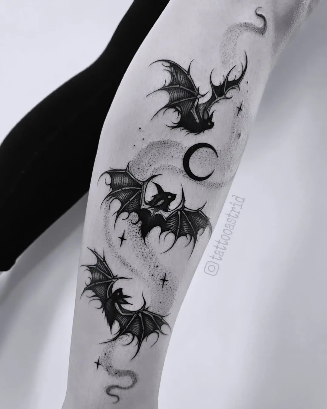 Elegant bat tattoos with mystical designs