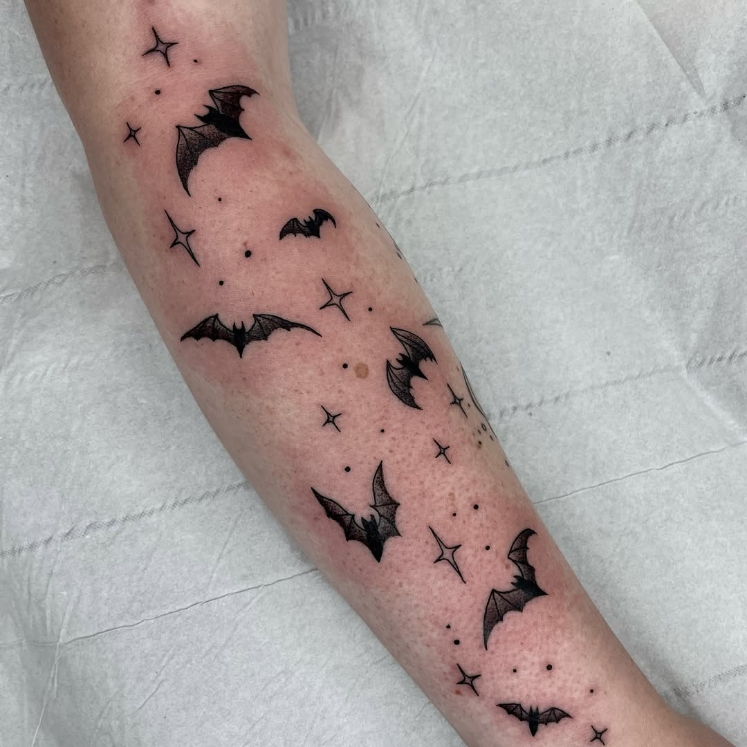 Stunning bat tattoo design with celestial vibes