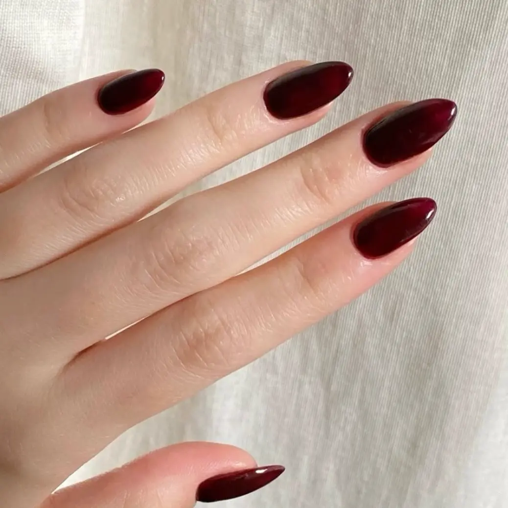 Elegant burgundy nails with a glossy finish