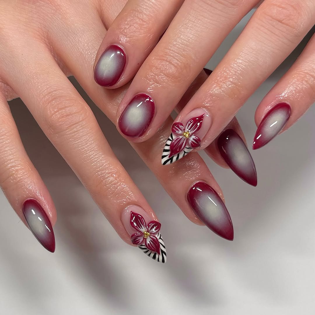 Elegant Burgundy Nails with Floral Detail