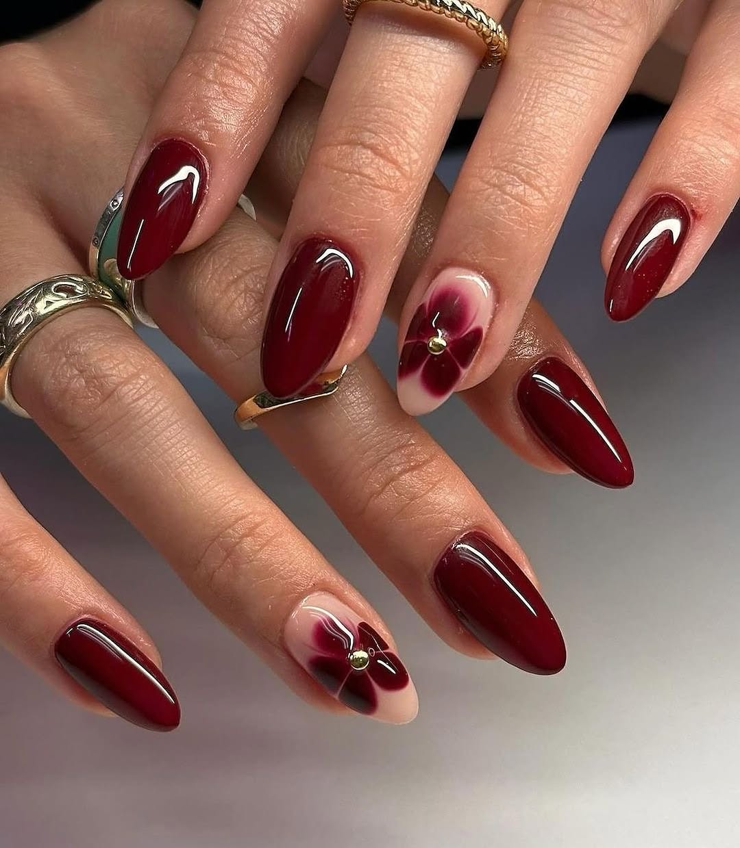 Elegant Burgundy Nails with Floral Accents