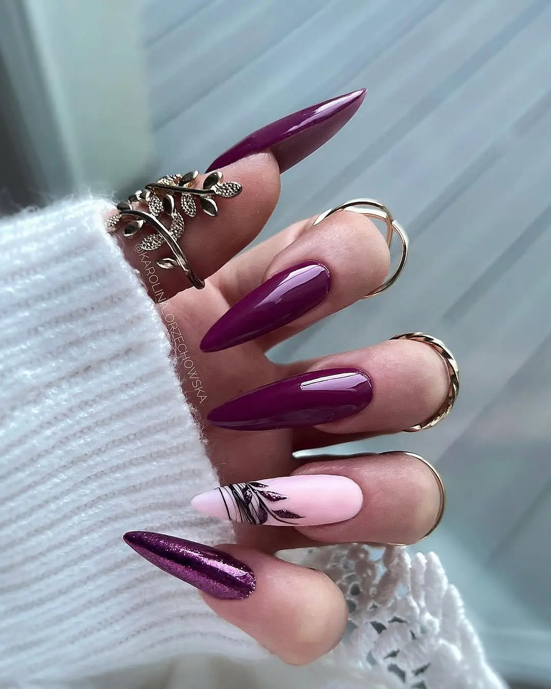 Stylish Burgundy Nails with Unique Accents