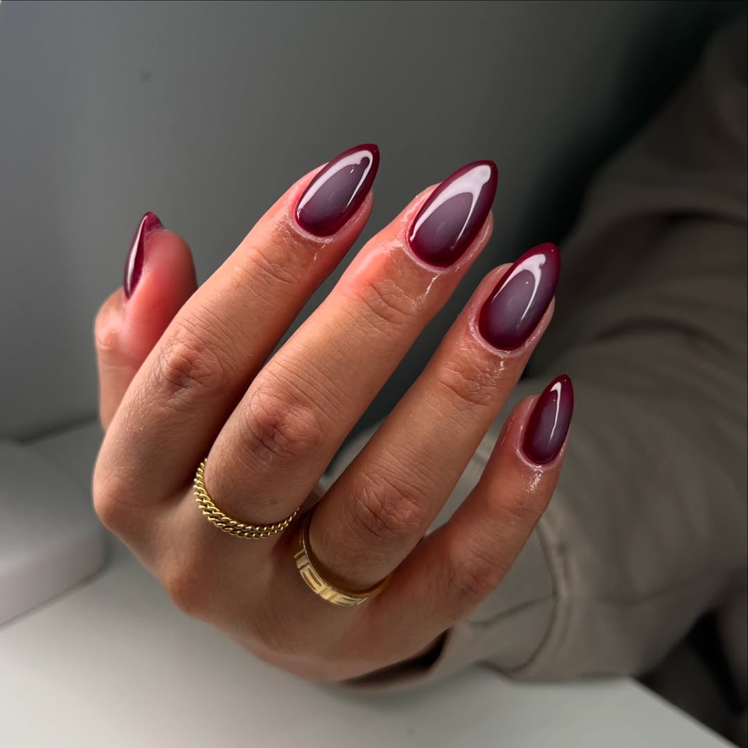 Stunning burgundy stiletto nails with glossy finish